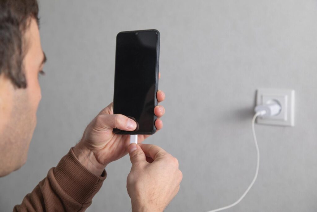 Man connect cable smartphone charging 220873 66739